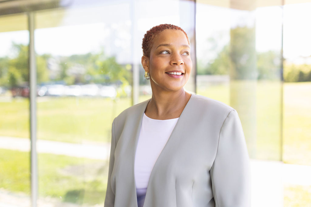 A photograph of CEO Toni R. Barton looking hopefully toward the camera.